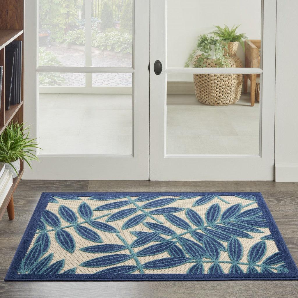 7? x 10? Navy and Beige Leaves Indoor Outdoor Area Rug - AFS